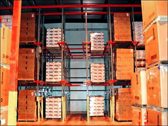 4 Deep Drive-In Pallet Rack 4 Deep Drive-In Pallet Rack Loaded with Stock and Pallets inf Warehouse Environment