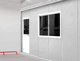 white modular office on the warehouse floor